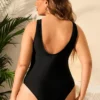 Maillot de bain noir sculptant à empiècements tulle